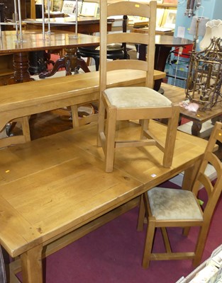 Lot 1301 - A contemporary blond joined oak dining suite,...