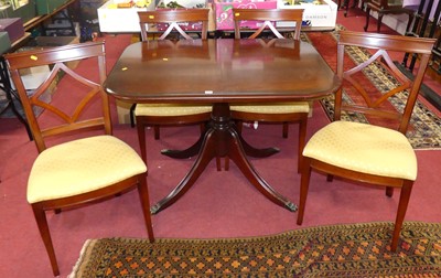 Lot 1306 - A reproduction mahogany dining suite,...