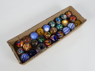 Lot 372 - A collection of various coloured glass marbles