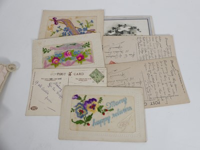 Lot 414 - A collection of WWI postcards and silks to...