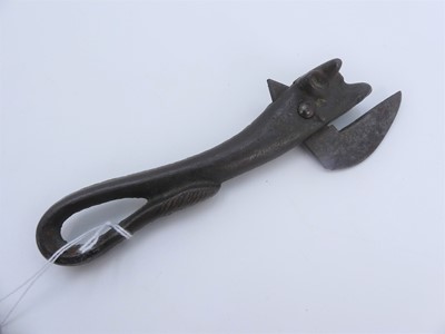 Lot 430 - A 19th century style cast iron tin opener in...