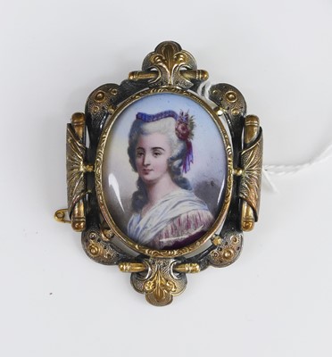 Lot 282 - A painted porcelain miniature portrait brooch,...