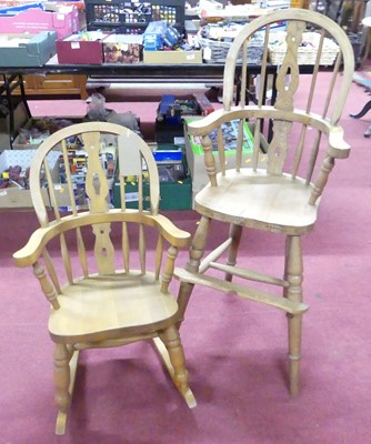 Lot 1313 - A child's beech splat back rocking tub chair,...