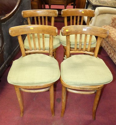 Lot 1331 - A set of four bentwood panelled seat cafe chairs