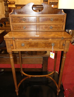 Lot 1344 - A contemporary yew lady's writing desk, having...