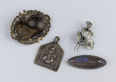 Lot 323 - A gilt metal and agate set oval brooch;...