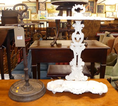 Lot 1368 - A white painted floral decorated cast iron...