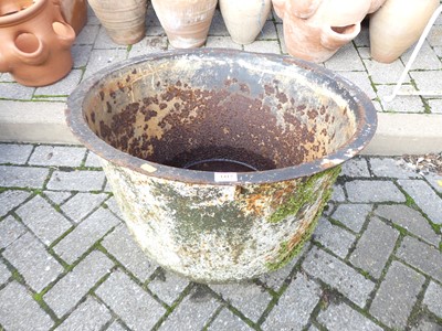 Lot 1417 - A circa 1900 iron log bucket, in distressed...