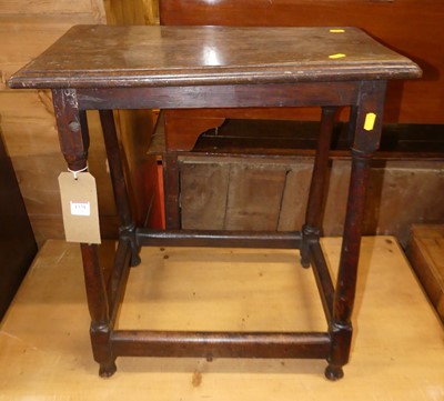 Lot 1379 - An antique joined oak low rectangular side...