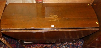 Lot 1382 - An antique joined fruitwood D-end drop leaf...