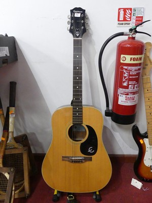 Lot 512 - An Epiphone FT-145 acoustic guitar; together...