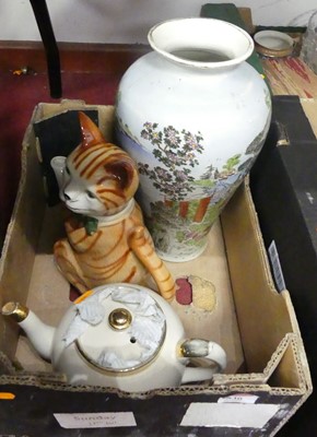 Lot 536 - A novelty pottery teapot in the form of a cat,...