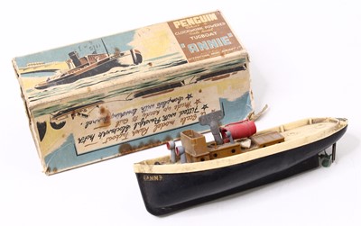 Lot 1987 - Penguin clockwork powered plastic Tug Boat...