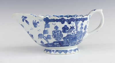 Lot 2049 - A Bow blue and white porcelain sauce boat,...