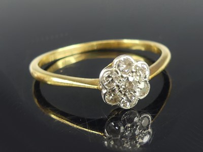 Lot 2700 - A yellow and white metal diamond circular...