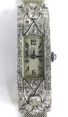 Lot A white metal Art Deco diamond manual wind...