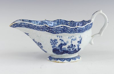 Lot 2056 - A Bow blue and white porcelain sauce boat,...