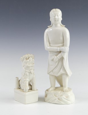 Lot 2107 - A Chinese blanc-de-chine porcelain figure of...