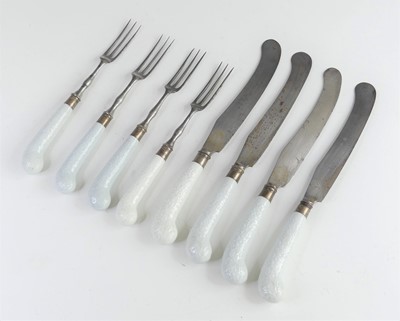 Lot 2083 - Seven Worcester porcelain-handled knives and...