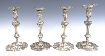 Lot 2190 - A matched set of four George III cast silver...