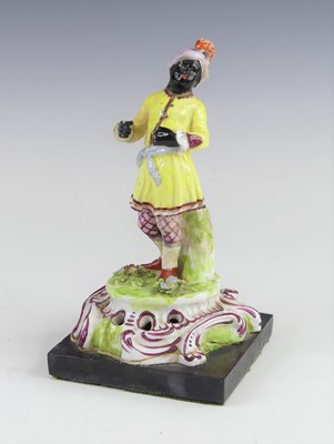 Lot 2125 - A German porcelain blackamoor figure, 18th...