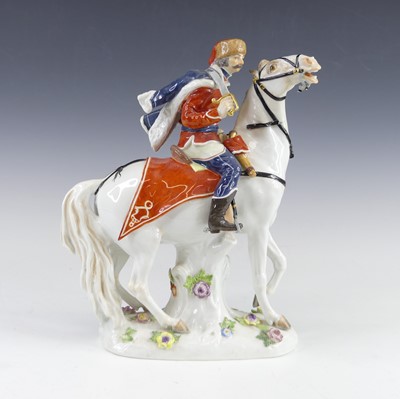 Lot 2126 - A Meissen porcelain figure of a Hussar soldier,...