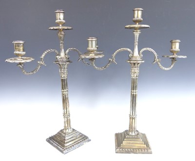 Lot 2191 - A pair of George II silver candlesticks with...