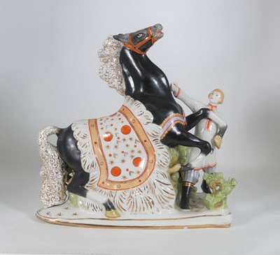 Lot 133 - A Verbilki porcelain group of Ivan the fool...