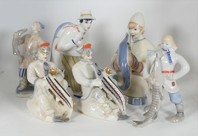 Lot 145 - A collection of six Soviet porcelain figures...