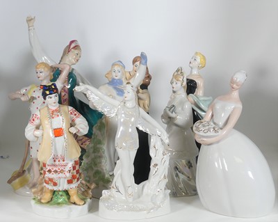 Lot 146 - A collection of nine Soviet porcelain figures...