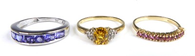 Lot 2624 - A modern 9ct gold padparadscha sapphire half...