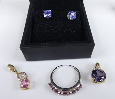 Lot 2733 - A pair of modern 18ct white gold tanzanite set...