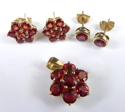 Lot 2734 - A pair of modern 9ct gold and Malawi ruby set...