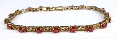 Lot 2735 - A modern 9ct gold Malawi ruby set bracelet,...