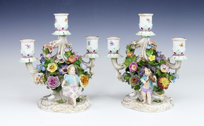 Lot 2093 - A pair of Meissen porcelain three-branch table...