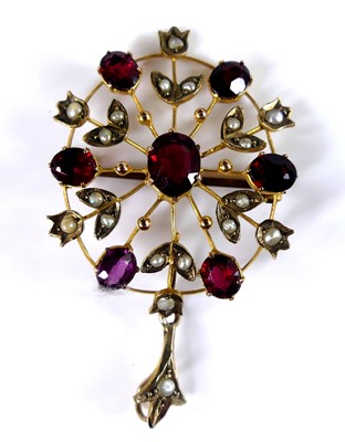 Lot 2539 - An Edwardian 9ct gold, garnet and seed pearl...