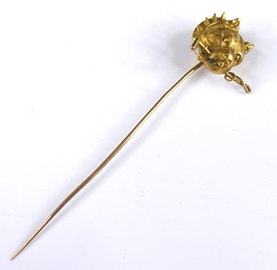 Lot 2705 - A yellow metal tie-pin fashioned as a French...