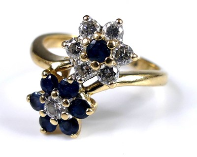 Lot 2541 - A contemporary 14ct gold, sapphire and diamond...