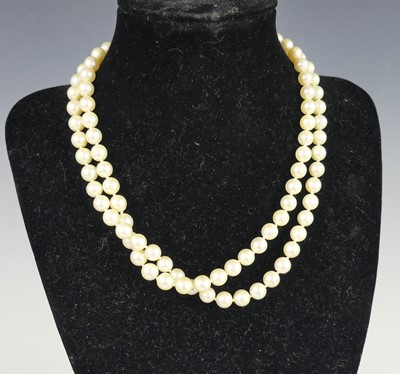 Lot 2708 - A cultured pearl double-string choker, as...