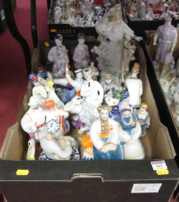 Lot 163 - A collection of Soviet porcelain figures, to...