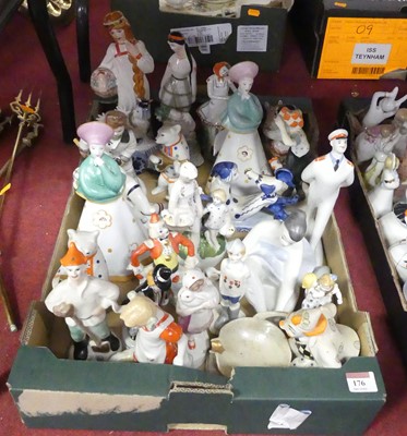 Lot 176 - A collection of Soviet porcelain figures, to...