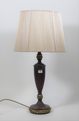 Lot 10 - A modern parcel-gilt table lamp with shade,...