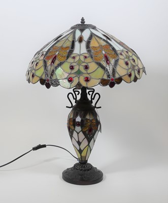 Lot 15 - A Tiffany style table lamp, having a stained...