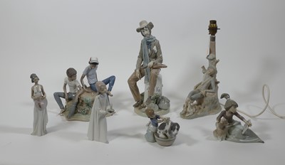 Lot 28 - A collection of seven Lladro porcelain figures,...