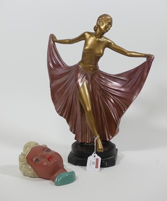 Lot 31 - An Art Deco style plaster figure of a lady,...