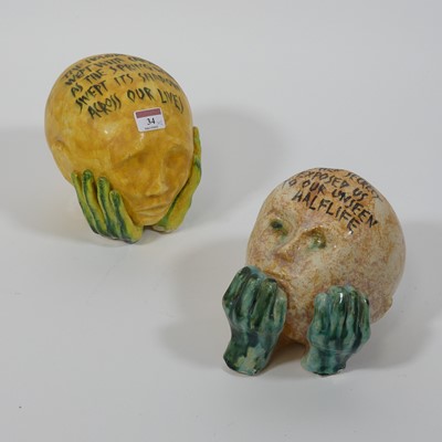 Lot 34 - Two studio pottery heads, colour glazes, each...