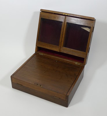 Lot 104 - An unusual oak box, containing a fitted...