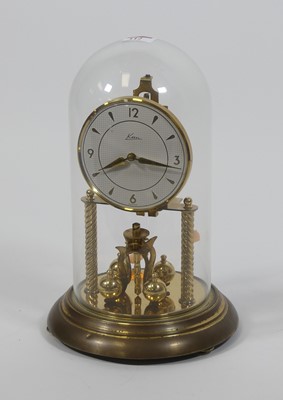 Lot 112 - A 20th century brass anniversary clock, housed...