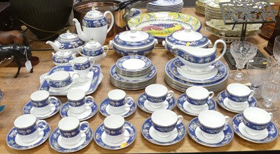 Lot 187 - A Wedgwood Blue Siam pattern six-place tea,...