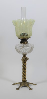 Lot 194 - A 19th century brass oil lamp, having a...